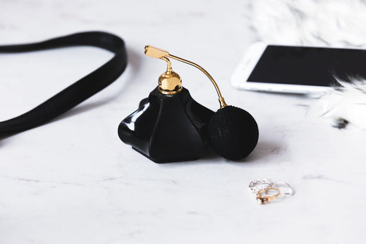 Amber Noir perfume bottle on a vanity table